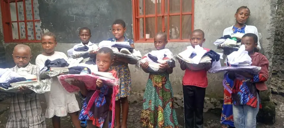 Children with new school uniforms