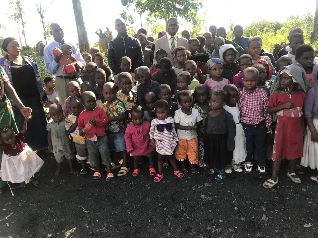 Large group of children in the village