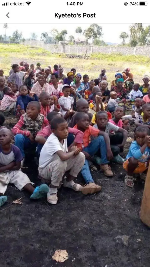 Women and children seated together