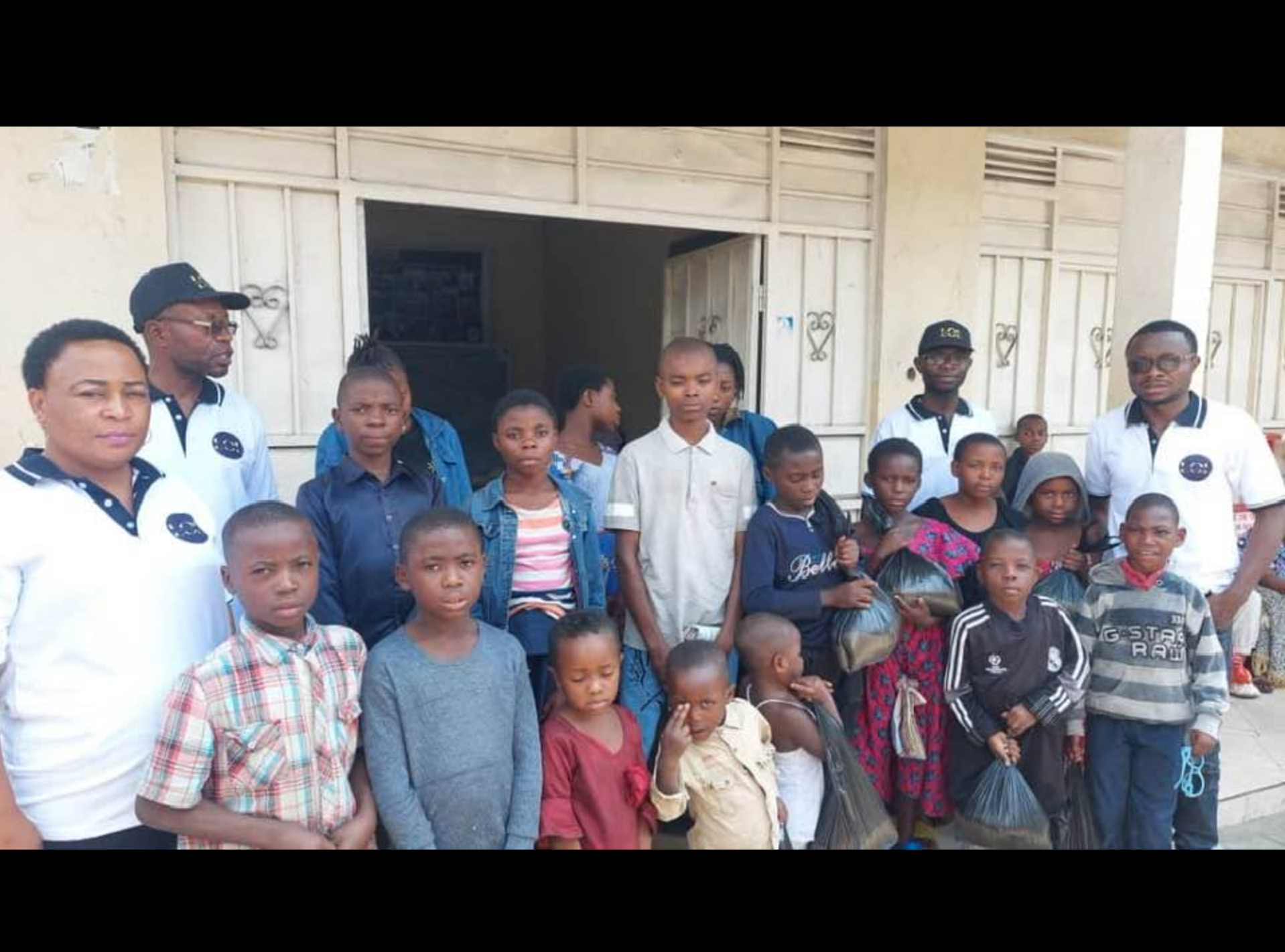 LOL team with orphans and supplies