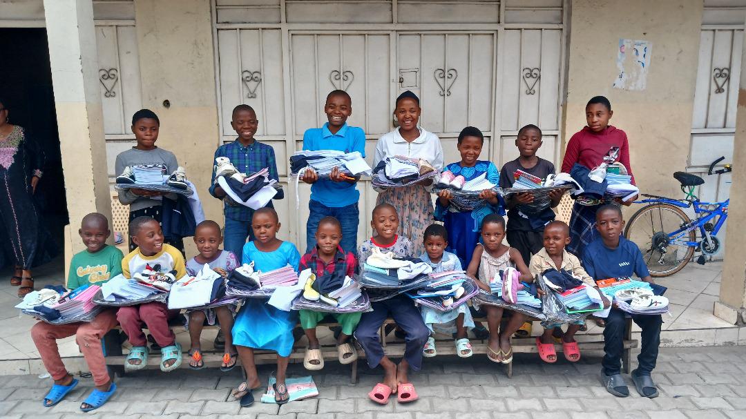 Smiling children with school backpacks