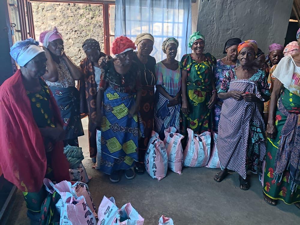 Elderly women with food bags