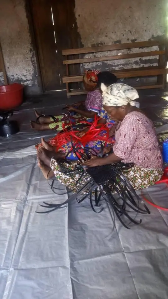 Women weaving baskets